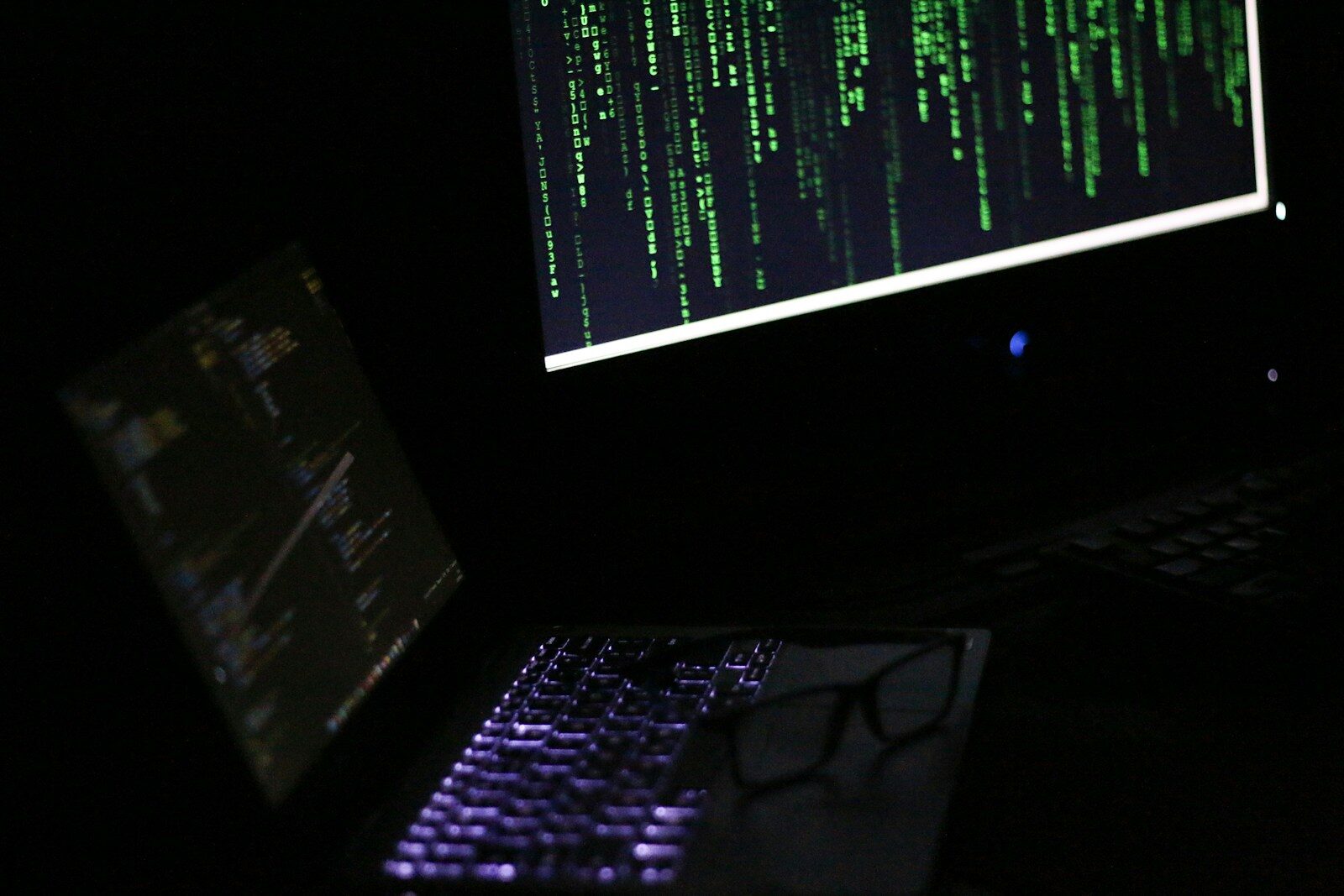A laptop computer sitting on top of a desk