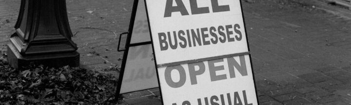 a sign that is on the side of the road