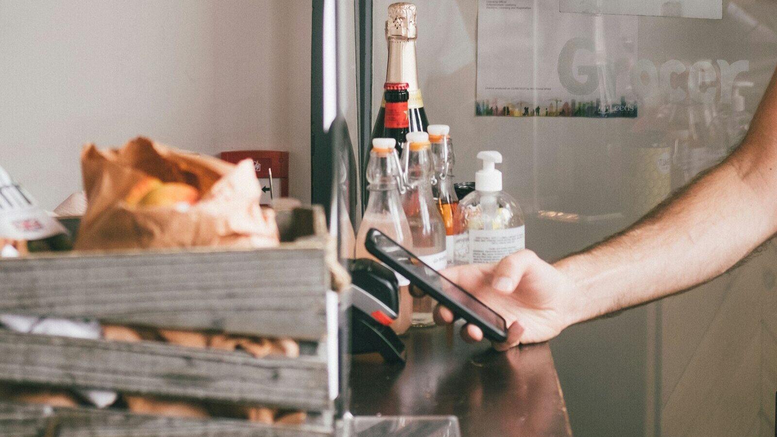 person holding silver iphone 6