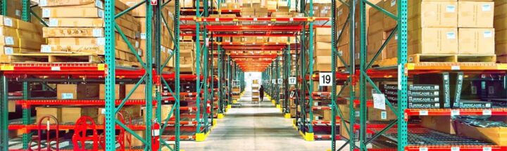 A warehouse is filled with shelves and boxes.