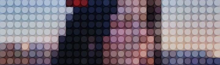 a woman in a blue shirt and purple tie