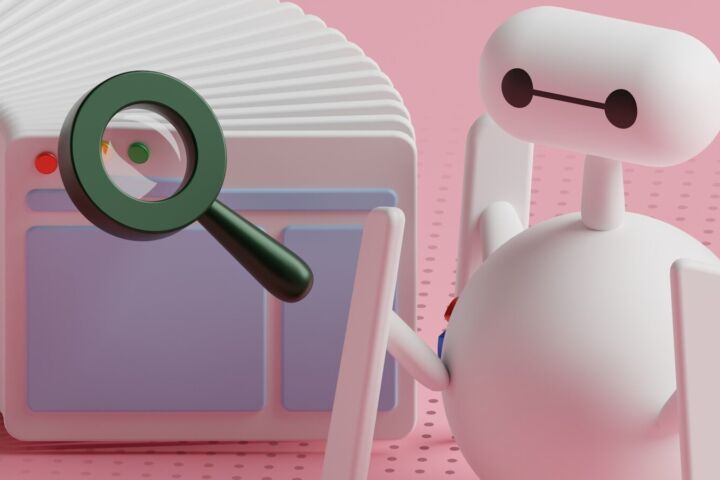 a white robot holding a magnifying glass