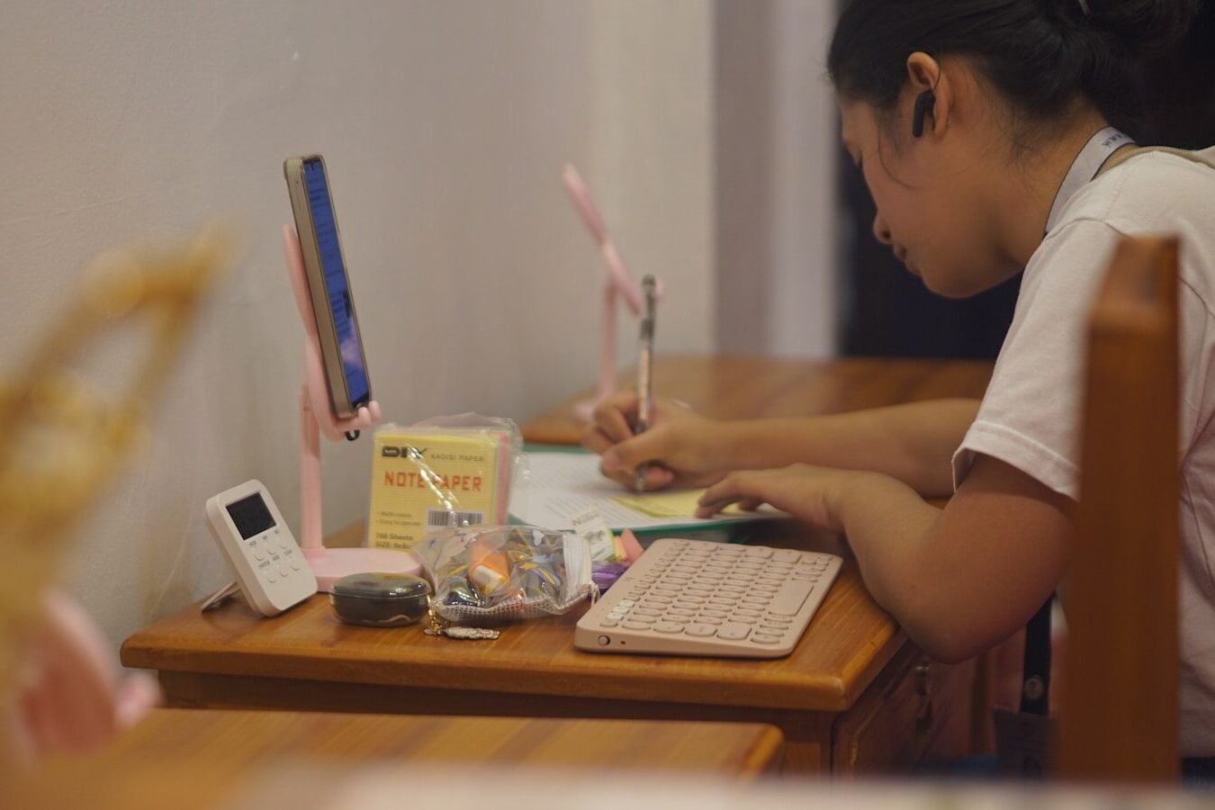 A person sitting at a desk with a computer