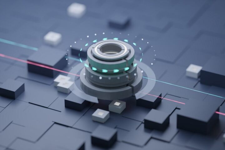 a close up of a metal object on a blue surface