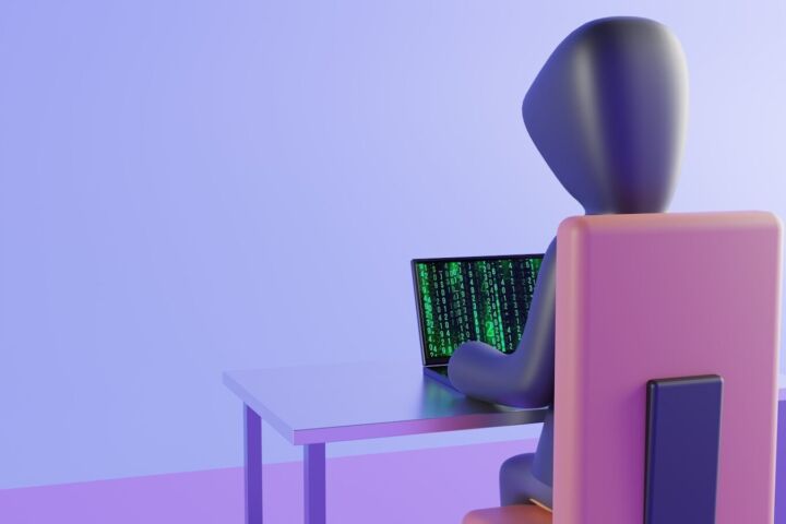 a few chairs with a table and a computer