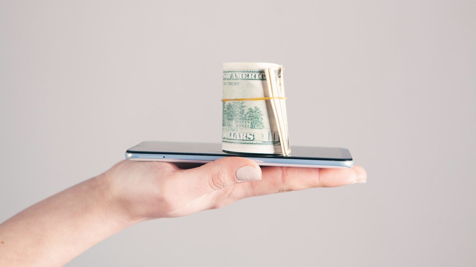person holding silver iphone 6
