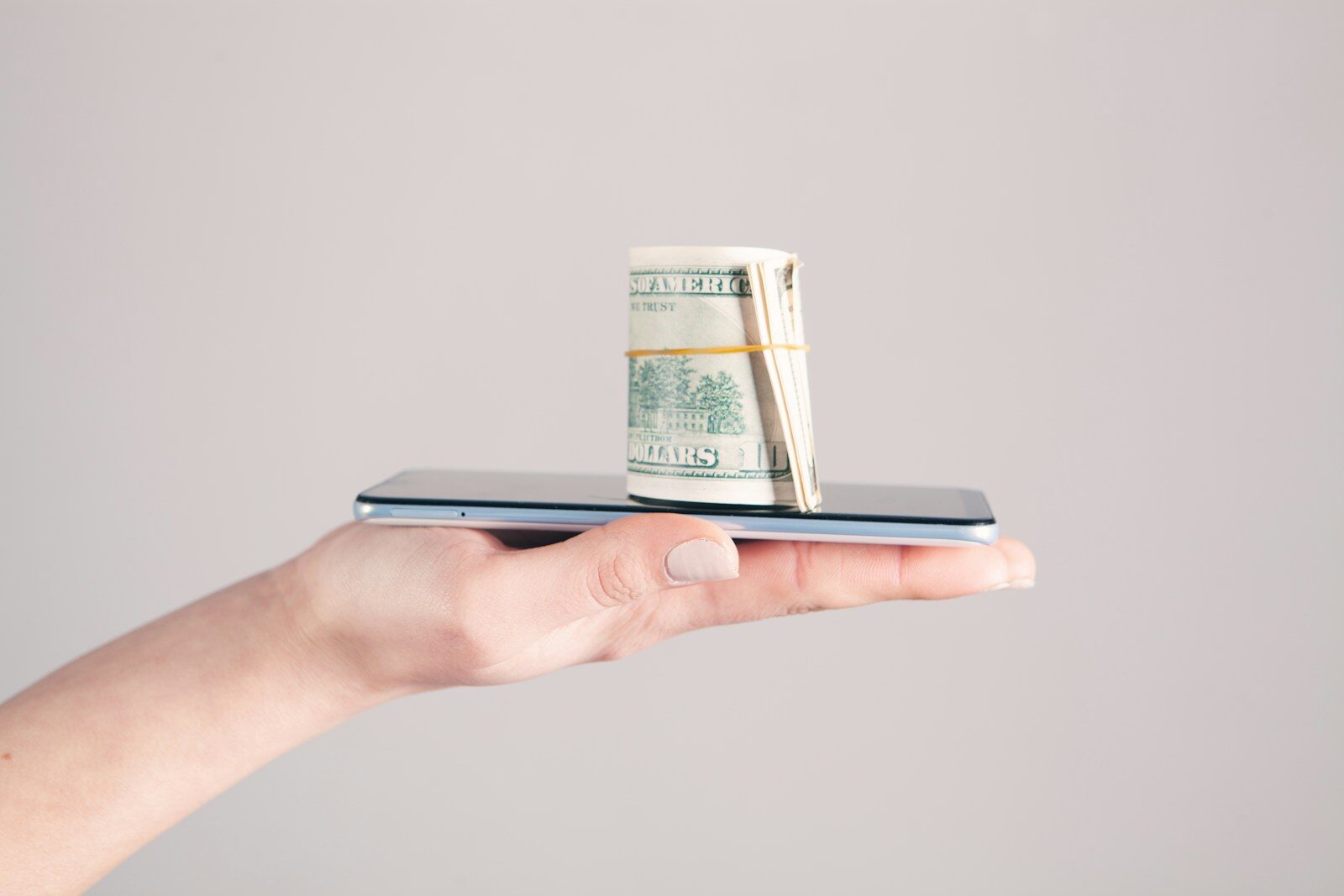 person holding silver iphone 6