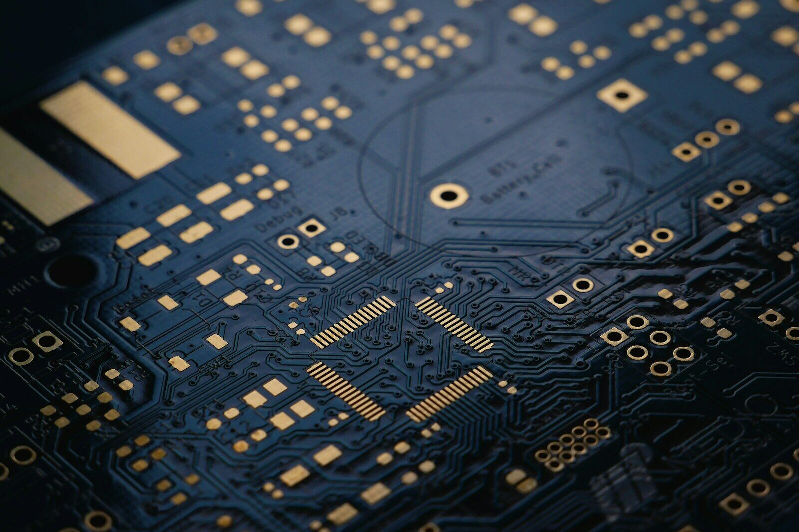 close up of dark blue circuit board