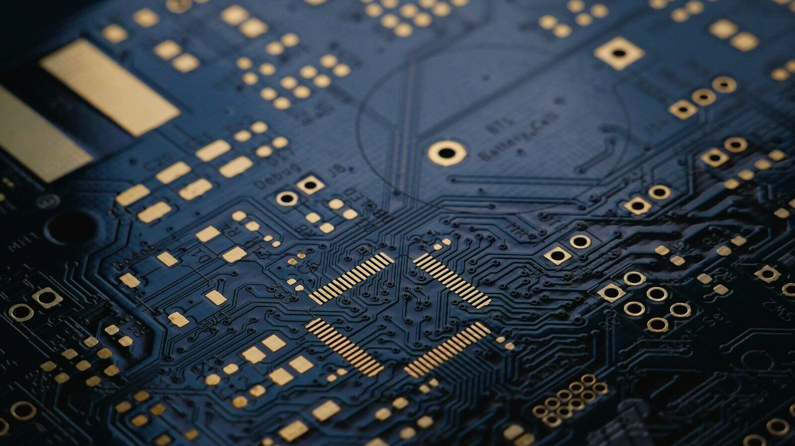 close up of dark blue circuit board