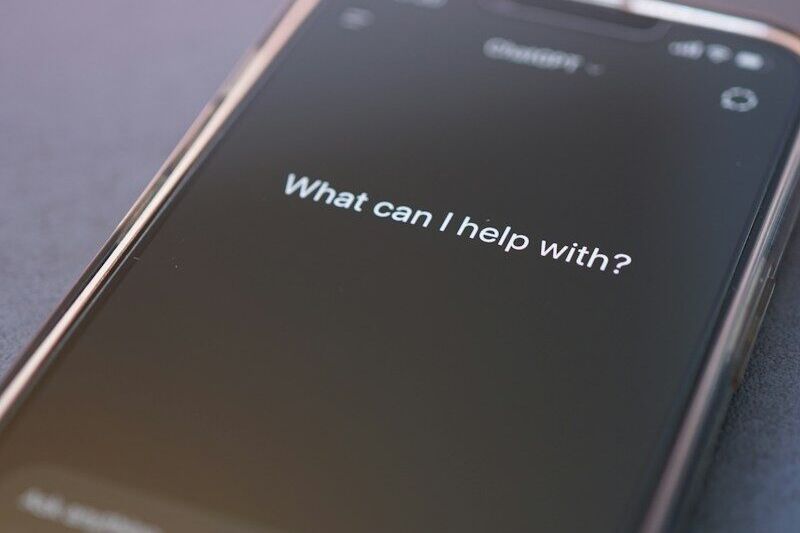 Phone screen asks: