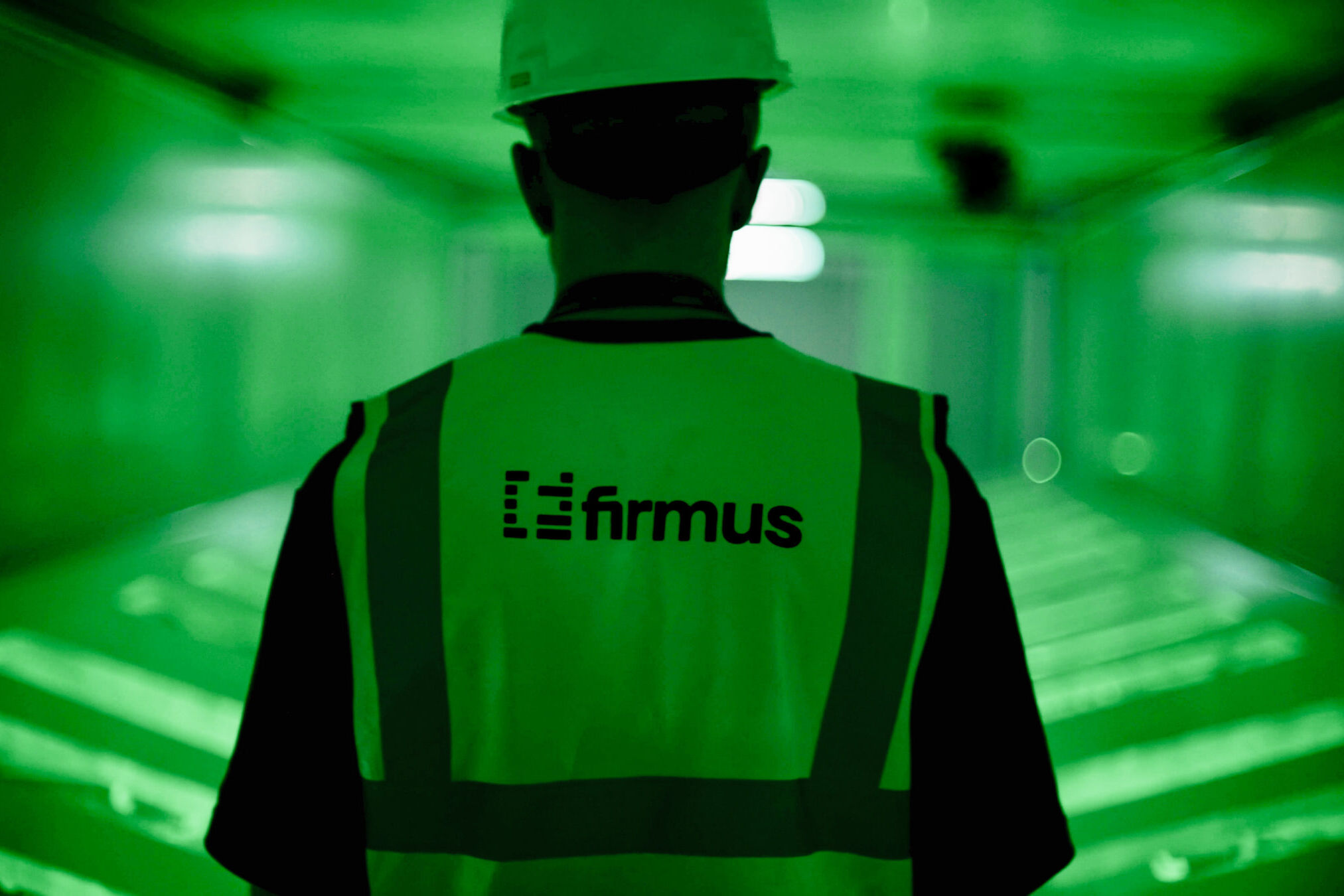 A Firmus employee walking through the company's AI infrastructure