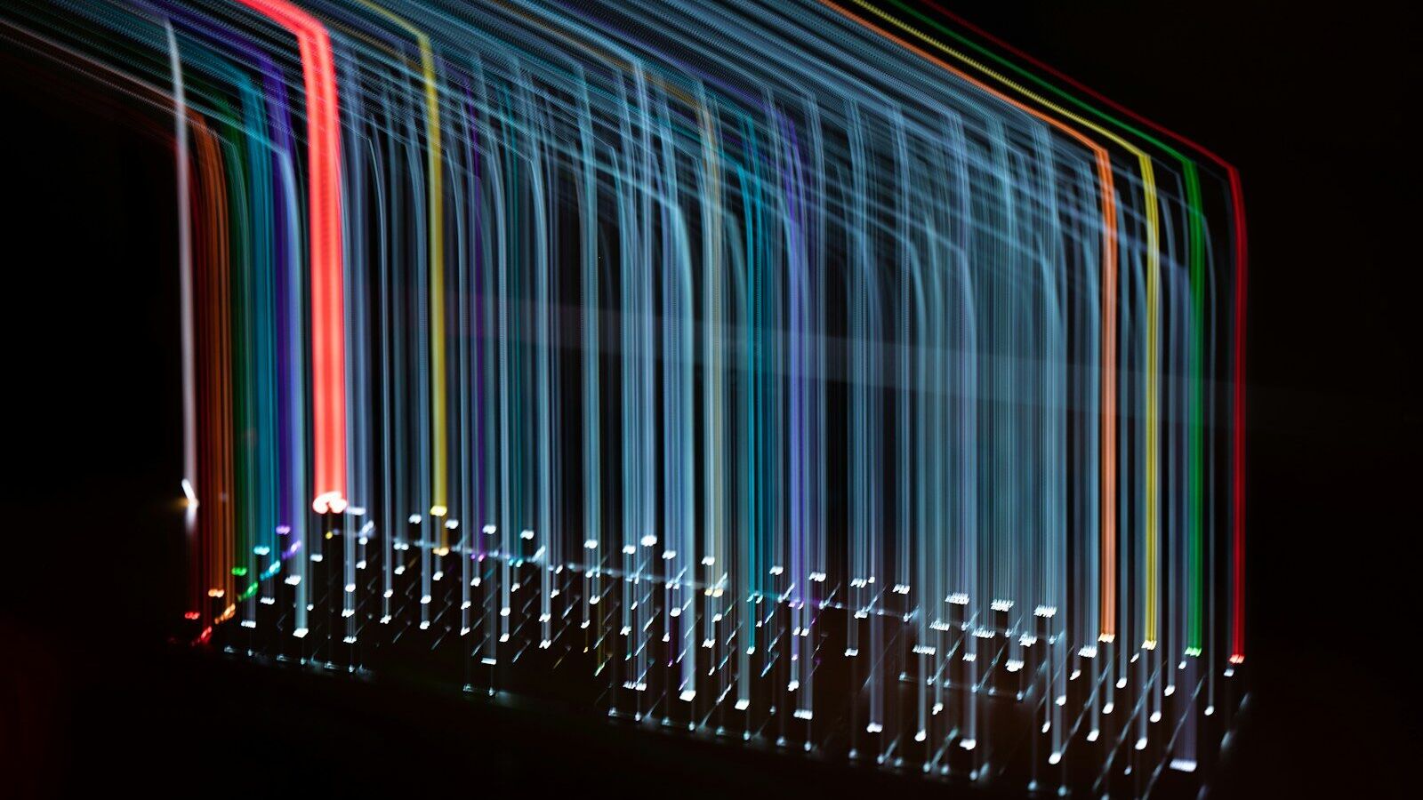 a long exposure of colored lights in the dark